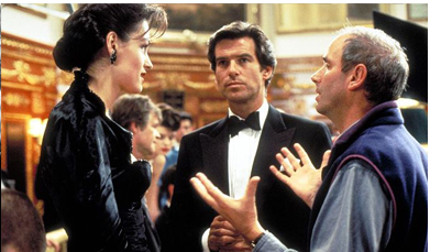 Famke Janssen with Pierce Brosnan and GoldenEye director Martin Campbell