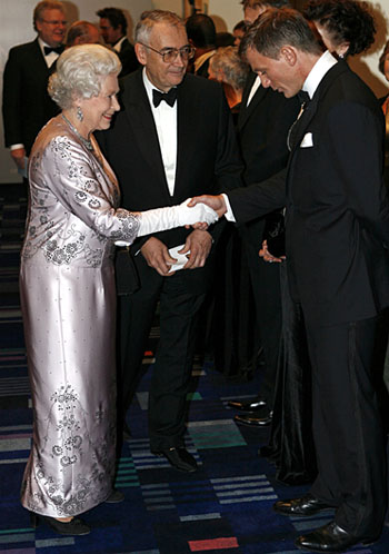 Daniel Craig meets Her Majesty The Queen at the premiere of Casino Royale
