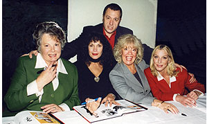 Graham Rye with 'Bond Girls' at the  1999 signing