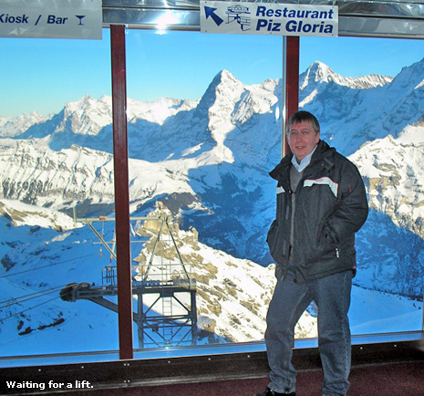 Fred waits for the cable car at Piz Gloria