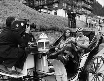 Diana Rigg & George Lazenby take a sleigh ride