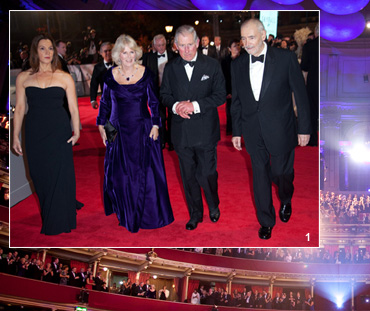The Duke and Duchess of Cornwall arrive at the Royal Albert Hall flanked by Skyfall co-producers Barbara Broccoli and Michael G. Wilson