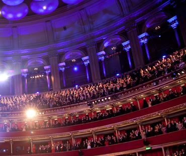The audience inside the Royal Albert Hall await the arrival of the guests of honour and stars of the film