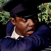 Adrian Robinson as Hearse Driver