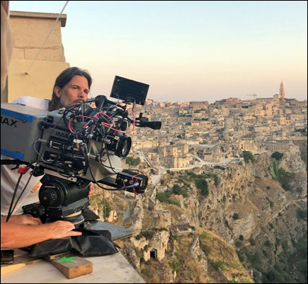 Director of photography Linus Sandgren lines up a shot with an IMAX 65mm camera in Matera, Italy