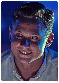 Logan Ash played by Billy Magnussen