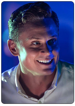 Logan Ash played by Billy Magnussen