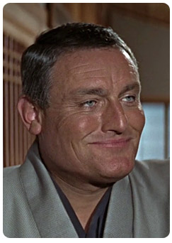 Henderson played by Charles Gray