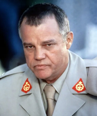 Brad Whitaker (Joe Don Baker)