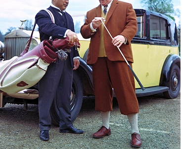 Harold Sakata as Oddjob & Gert Frobe as Goldfinger in the 1964 film