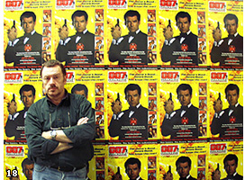 GRAHAM RYE in front of the 007 MAGAZINE publicity wall