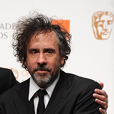 Sir Christopher Lee is presented with the BAFTA fellowship by Tim Burton