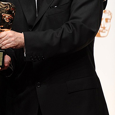 Sir Christopher Lee is presented with the BAFTA fellowship by Tim Burton