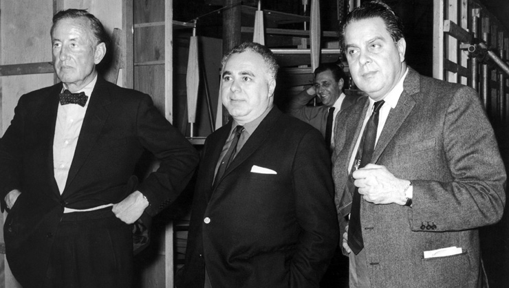 James Bond creator Ian Fleming with co-producers Harry Saltzman and Albert R. 'Cubby' Broccoli on the set of Goldfinger (1964)