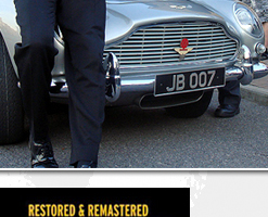 Donald Standen and Ian U'Chong pose with the Aston Martin DB5