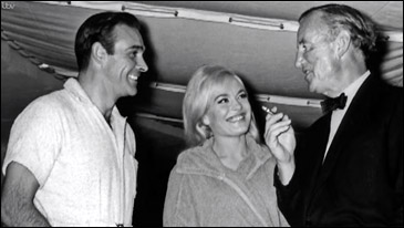 Sean Connery, Shirley Eaton and Ian Fleming on the set of Goldfinger (1964)