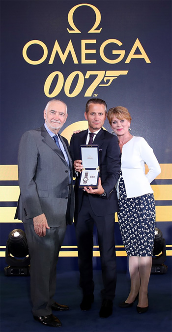 OMEGA President and CEO Raynald Aeschlimann alongside Bond film producer Michael G. Wilson and Samantha Bond