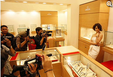 Caterina Murino poses for photographers at the OMEGA Boutique in Jakarta