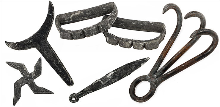 Selection of Ninja throwing stars and grappling weapons